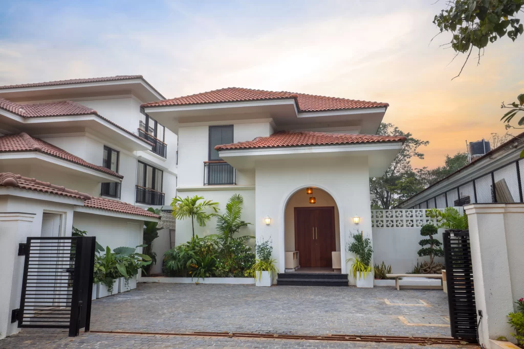 Luxury villa exterior with tiled roof and modern architecture in North Goa
